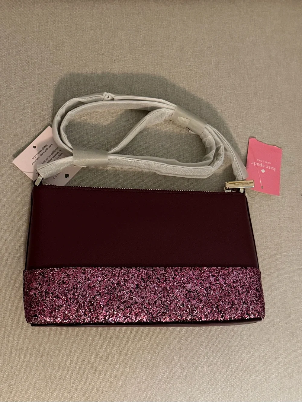 kate spade Plum Crossbody with Pink Glitter Accent